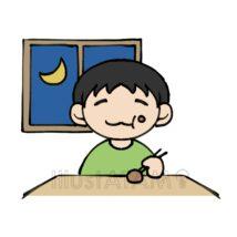 夕食を食べる男の子